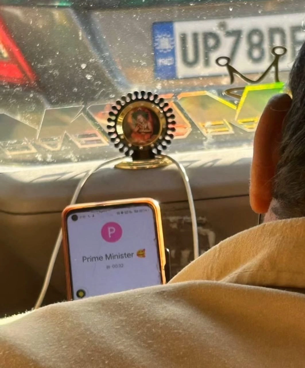 someone on the phone to "Prime Minister 🥰"