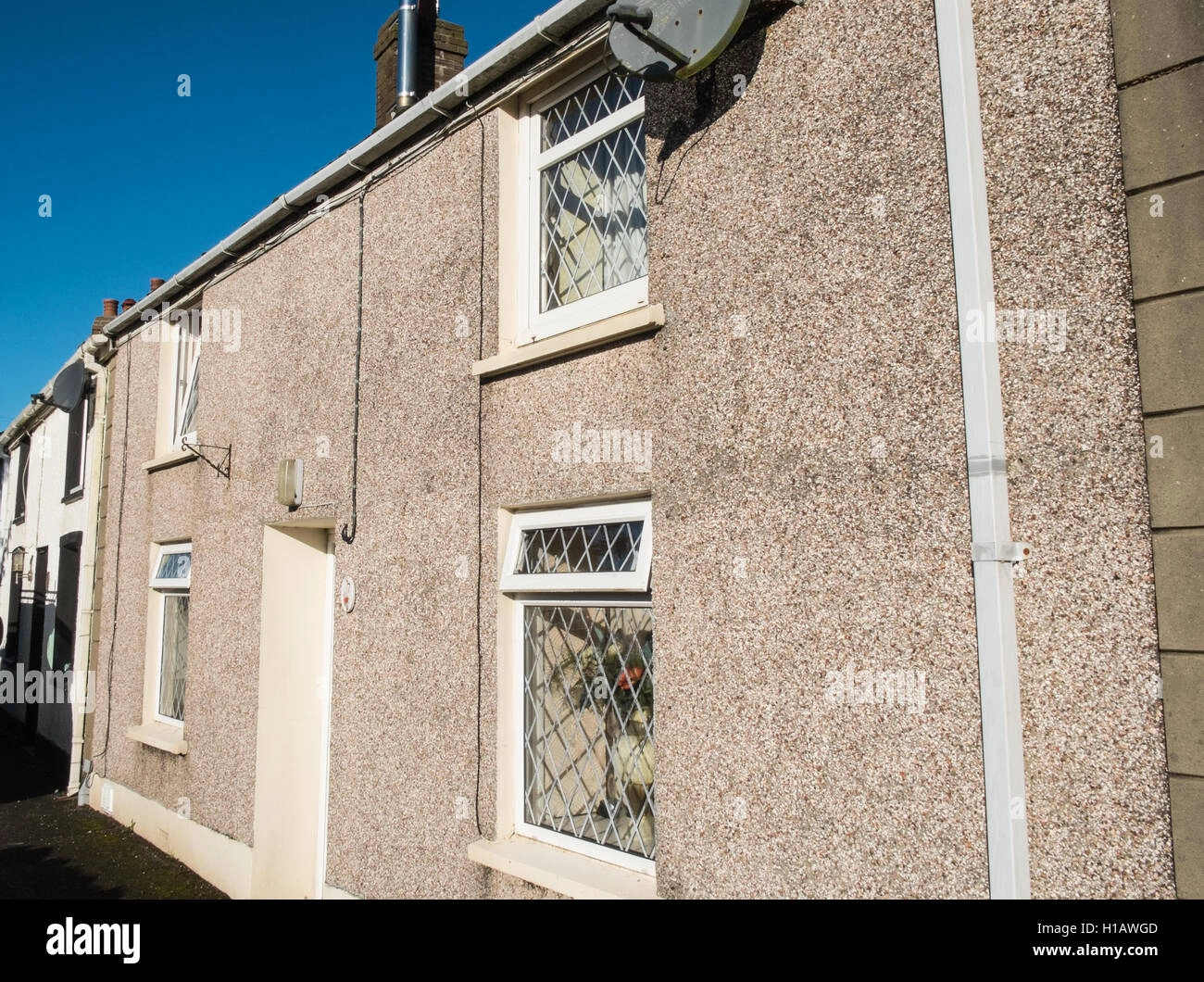 pebbledash terraced house in the UK