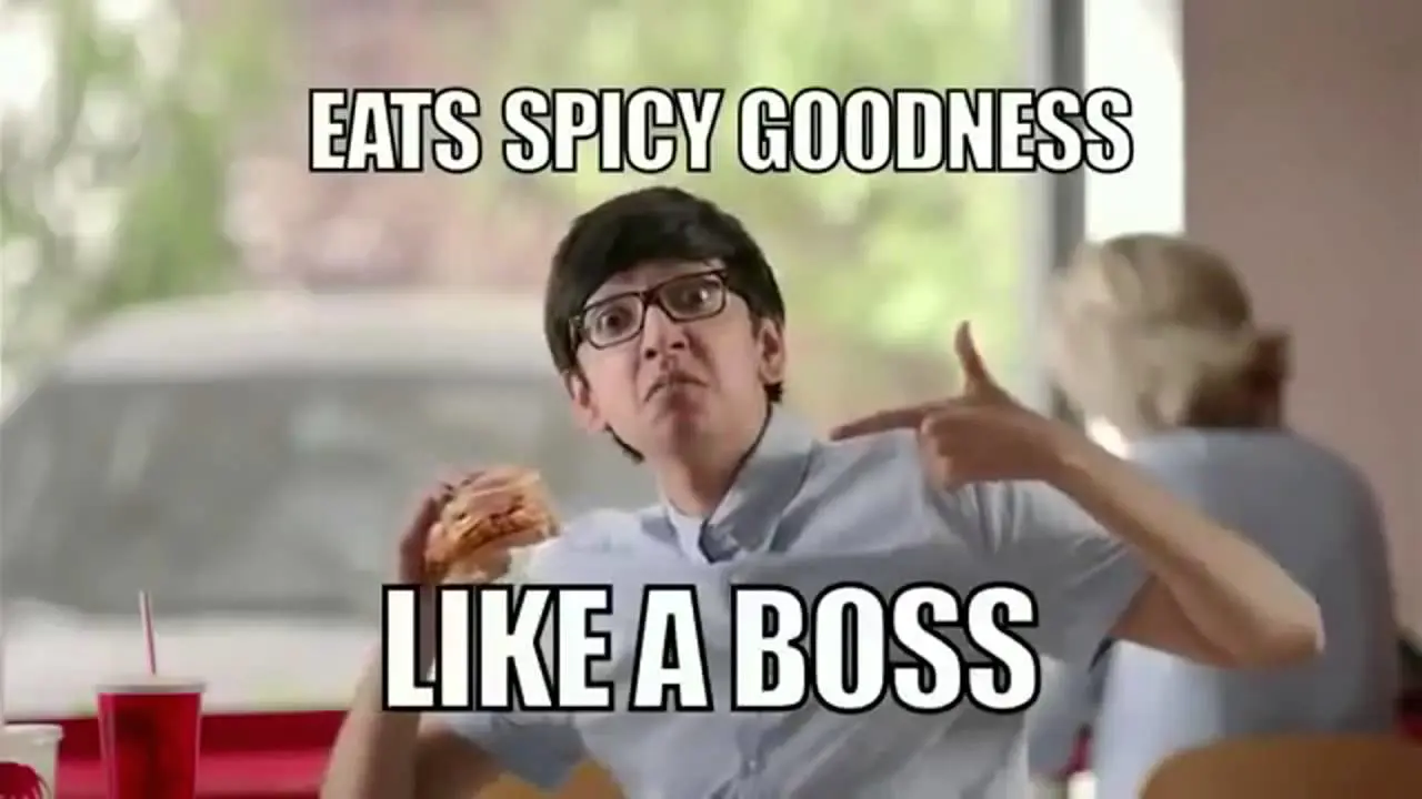 pic of a guy pointing to the new wendys spicy jalapeno feesco chicken and it says "eats spicy goodness like a boss"
